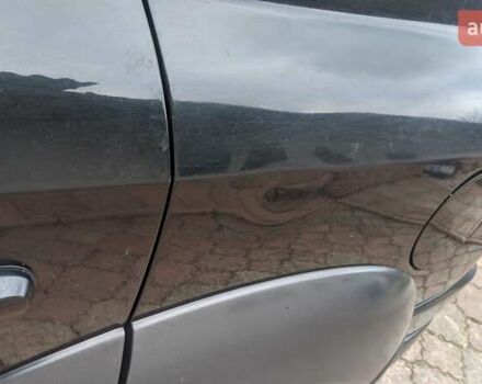 Черный Хендай Туксон, объемом двигателя 2 л и пробегом 163 тыс. км за 8100 $, фото 11 на Automoto.ua