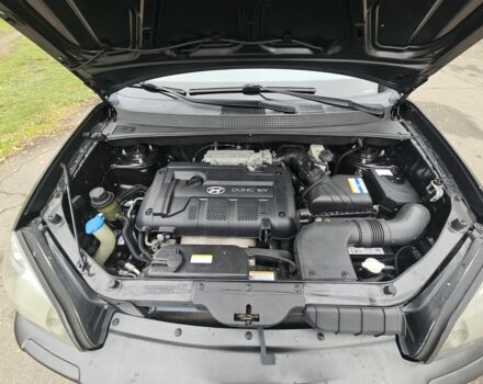 Чорний Хендай Туксон, об'ємом двигуна 2 л та пробігом 186 тис. км за 8300 $, фото 20 на Automoto.ua