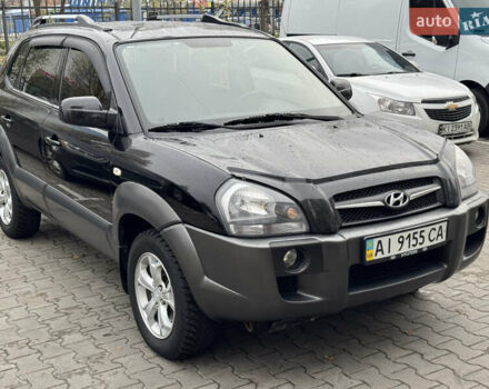 Черный Хендай Туксон, объемом двигателя 2 л и пробегом 157 тыс. км за 8900 $, фото 2 на Automoto.ua