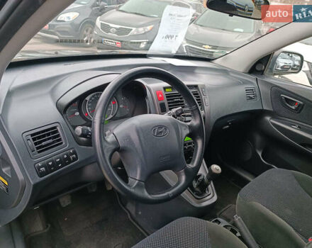 Черный Хендай Туксон, объемом двигателя 2 л и пробегом 192 тыс. км за 7990 $, фото 18 на Automoto.ua