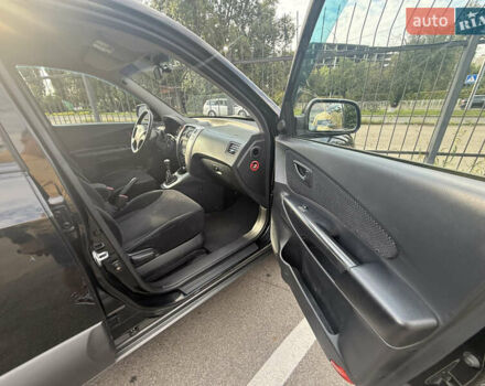 Черный Хендай Туксон, объемом двигателя 2 л и пробегом 218 тыс. км за 6700 $, фото 11 на Automoto.ua