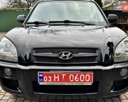 Чорний Хендай Туксон, об'ємом двигуна 2 л та пробігом 182 тис. км за 8299 $, фото 39 на Automoto.ua