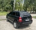 Черный Хендай Туксон, объемом двигателя 2 л и пробегом 171 тыс. км за 8500 $, фото 6 на Automoto.ua