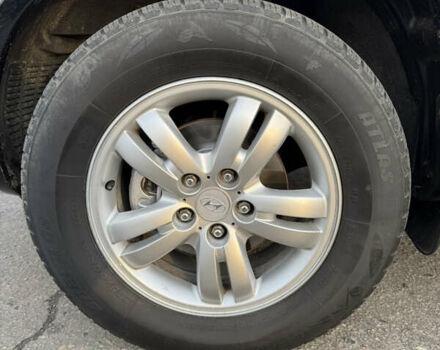 Черный Хендай Туксон, объемом двигателя 2 л и пробегом 210 тыс. км за 7850 $, фото 18 на Automoto.ua