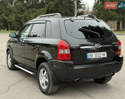 Черный Хендай Туксон, объемом двигателя 1.99 л и пробегом 240 тыс. км за 7200 $, фото 24 на Automoto.ua