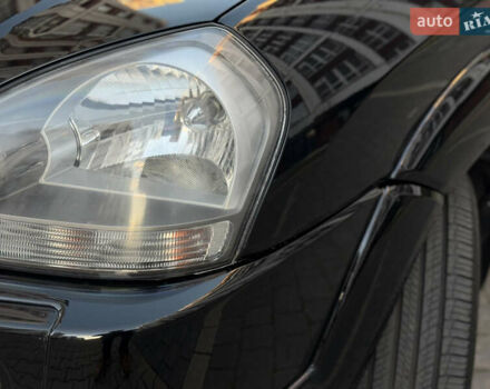 Чорний Хендай Туксон, об'ємом двигуна 2 л та пробігом 156 тис. км за 7850 $, фото 49 на Automoto.ua