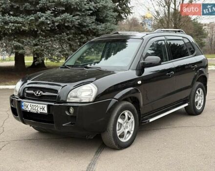 Черный Хендай Туксон, объемом двигателя 1.99 л и пробегом 240 тыс. км за 7200 $, фото 1 на Automoto.ua