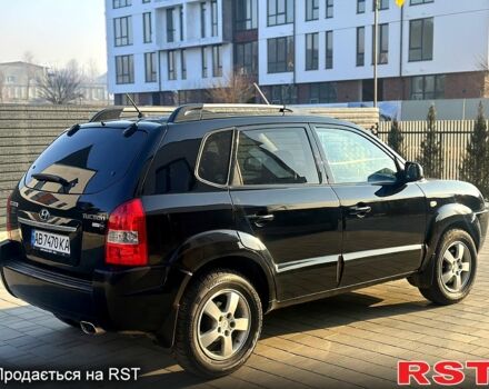 Черный Хендай Туксон, объемом двигателя 2 л и пробегом 225 тыс. км за 8200 $, фото 2 на Automoto.ua