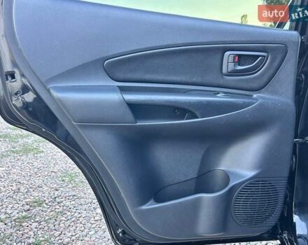 Черный Хендай Туксон, объемом двигателя 2 л и пробегом 230 тыс. км за 7500 $, фото 25 на Automoto.ua