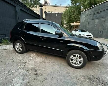 Черный Хендай Туксон, объемом двигателя 2 л и пробегом 245 тыс. км за 6500 $, фото 3 на Automoto.ua