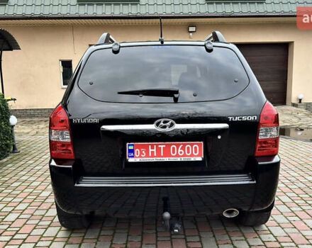 Чорний Хендай Туксон, об'ємом двигуна 2 л та пробігом 182 тис. км за 8299 $, фото 12 на Automoto.ua