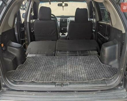 Черный Хендай Туксон, объемом двигателя 2 л и пробегом 163 тыс. км за 8100 $, фото 4 на Automoto.ua