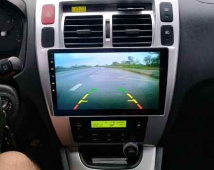 Черный Хендай Туксон, объемом двигателя 2 л и пробегом 260 тыс. км за 8450 $, фото 8 на Automoto.ua