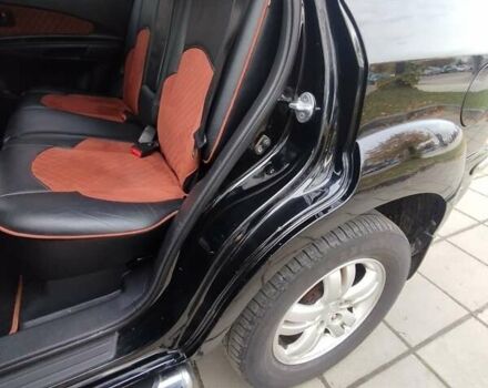 Черный Хендай Туксон, объемом двигателя 1.98 л и пробегом 214 тыс. км за 7700 $, фото 15 на Automoto.ua