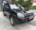 Черный Хендай Туксон, объемом двигателя 2 л и пробегом 137 тыс. км за 8400 $, фото 1 на Automoto.ua