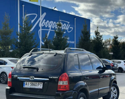 Черный Хендай Туксон, объемом двигателя 2 л и пробегом 300 тыс. км за 8300 $, фото 11 на Automoto.ua