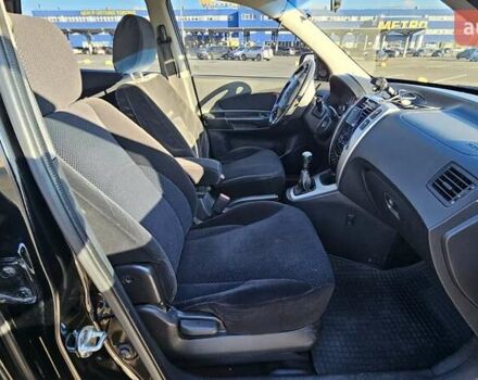 Чорний Хендай Туксон, об'ємом двигуна 1.98 л та пробігом 212 тис. км за 7766 $, фото 12 на Automoto.ua