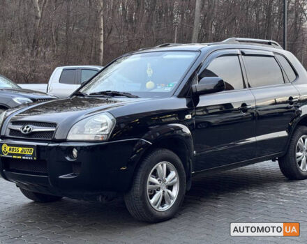 Черный Хендай Туксон, объемом двигателя 2 л и пробегом 170 тыс. км за 9200 $, фото 2 на Automoto.ua