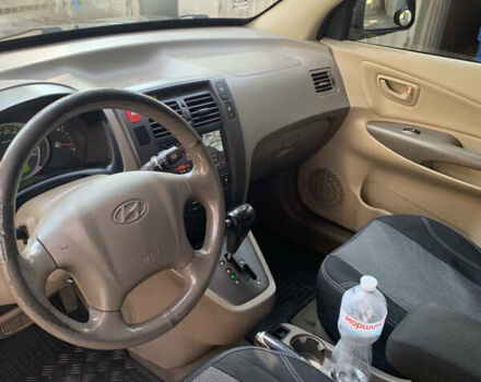 Черный Хендай Туксон, объемом двигателя 1.98 л и пробегом 260 тыс. км за 7777 $, фото 8 на Automoto.ua