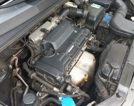 Черный Хендай Туксон, объемом двигателя 2 л и пробегом 168 тыс. км за 9000 $, фото 19 на Automoto.ua