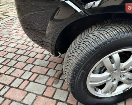 Чорний Хендай Туксон, об'ємом двигуна 2 л та пробігом 182 тис. км за 8299 $, фото 85 на Automoto.ua