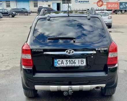 Черный Хендай Туксон, объемом двигателя 1.98 л и пробегом 172 тыс. км за 8500 $, фото 6 на Automoto.ua