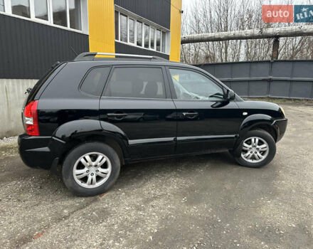 Чорний Хендай Туксон, об'ємом двигуна 2 л та пробігом 243 тис. км за 7999 $, фото 22 на Automoto.ua