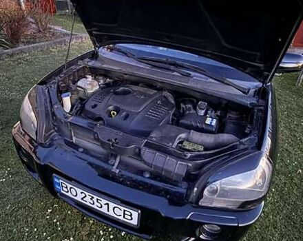 Черный Хендай Туксон, объемом двигателя 1.99 л и пробегом 203 тыс. км за 8000 $, фото 13 на Automoto.ua