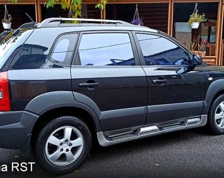 Чорний Хендай Туксон, об'ємом двигуна 2 л та пробігом 188 тис. км за 8800 $, фото 4 на Automoto.ua