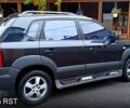 Чорний Хендай Туксон, об'ємом двигуна 2 л та пробігом 188 тис. км за 8800 $, фото 4 на Automoto.ua
