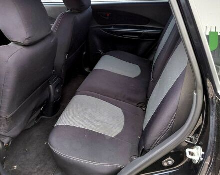 Чорний Хендай Туксон, об'ємом двигуна 2 л та пробігом 106 тис. км за 8350 $, фото 5 на Automoto.ua