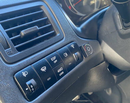 Черный Хендай Туксон, объемом двигателя 1.98 л и пробегом 218 тыс. км за 7200 $, фото 16 на Automoto.ua