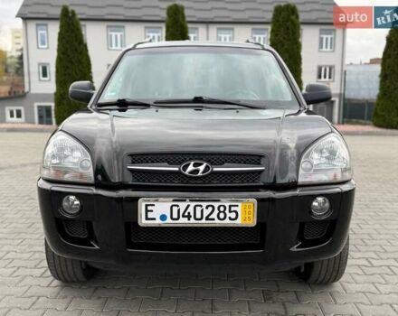 Черный Хендай Туксон, объемом двигателя 1.98 л и пробегом 239 тыс. км за 8700 $, фото 8 на Automoto.ua