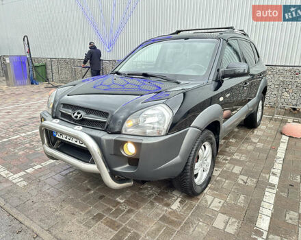 Чорний Хендай Туксон, об'ємом двигуна 2.66 л та пробігом 395 тис. км за 9950 $, фото 3 на Automoto.ua