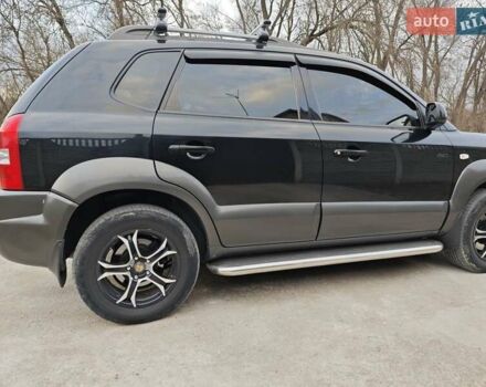 Черный Хендай Туксон, объемом двигателя 2 л и пробегом 182 тыс. км за 9000 $, фото 5 на Automoto.ua