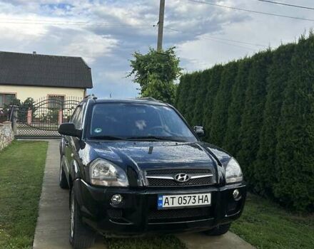 Черный Хендай Туксон, объемом двигателя 2 л и пробегом 255 тыс. км за 8300 $, фото 7 на Automoto.ua