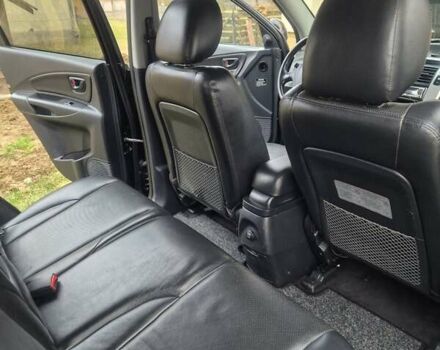 Чорний Хендай Туксон, об'ємом двигуна 1.99 л та пробігом 181 тис. км за 8150 $, фото 7 на Automoto.ua