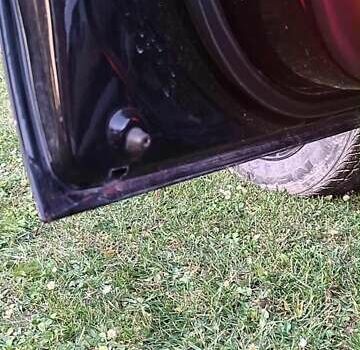 Черный Хендай Туксон, объемом двигателя 1.99 л и пробегом 203 тыс. км за 8000 $, фото 9 на Automoto.ua