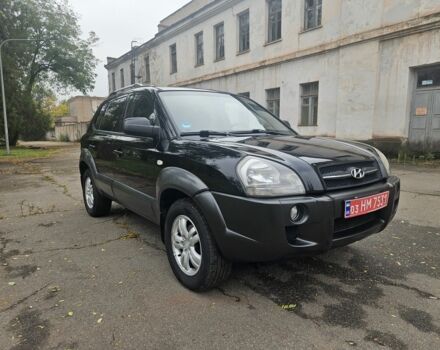 Чорний Хендай Туксон, об'ємом двигуна 2 л та пробігом 186 тис. км за 8300 $, фото 3 на Automoto.ua