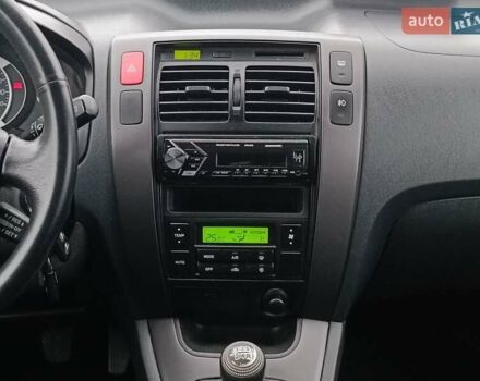 Черный Хендай Туксон, объемом двигателя 2 л и пробегом 192 тыс. км за 7990 $, фото 15 на Automoto.ua