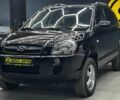 Черный Хендай Туксон, объемом двигателя 2 л и пробегом 224 тыс. км за 7800 $, фото 2 на Automoto.ua
