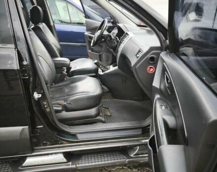 Черный Хендай Туксон, объемом двигателя 1.98 л и пробегом 189 тыс. км за 7800 $, фото 17 на Automoto.ua