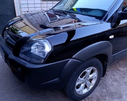 Черный Хендай Туксон, объемом двигателя 2 л и пробегом 261 тыс. км за 8900 $, фото 9 на Automoto.ua