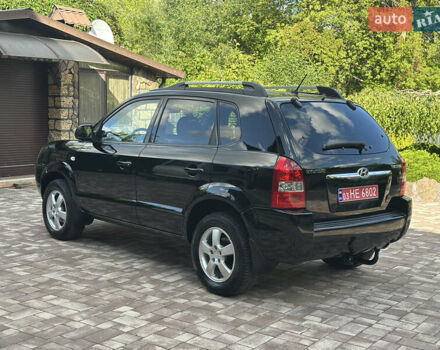 Черный Хендай Туксон, объемом двигателя 2 л и пробегом 218 тыс. км за 8700 $, фото 6 на Automoto.ua