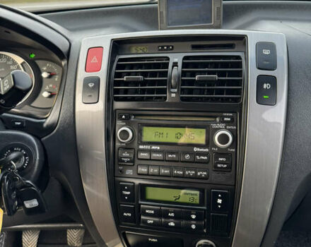 Черный Хендай Туксон, объемом двигателя 2 л и пробегом 210 тыс. км за 7850 $, фото 30 на Automoto.ua