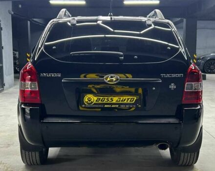 Черный Хендай Туксон, объемом двигателя 2 л и пробегом 224 тыс. км за 7800 $, фото 4 на Automoto.ua