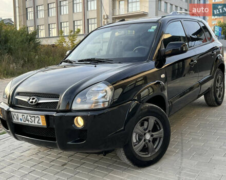 Чорний Хендай Туксон, об'ємом двигуна 1.98 л та пробігом 185 тис. км за 7199 $, фото 1 на Automoto.ua