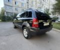 Черный Хендай Туксон, объемом двигателя 2 л и пробегом 228 тыс. км за 7950 $, фото 5 на Automoto.ua
