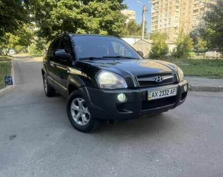 Черный Хендай Туксон, объемом двигателя 2 л и пробегом 228 тыс. км за 7950 $, фото 2 на Automoto.ua