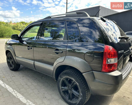 Чорний Хендай Туксон, об'ємом двигуна 1.98 л та пробігом 279 тис. км за 8200 $, фото 1 на Automoto.ua